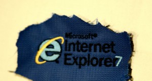 Remove button text from input in ie7
